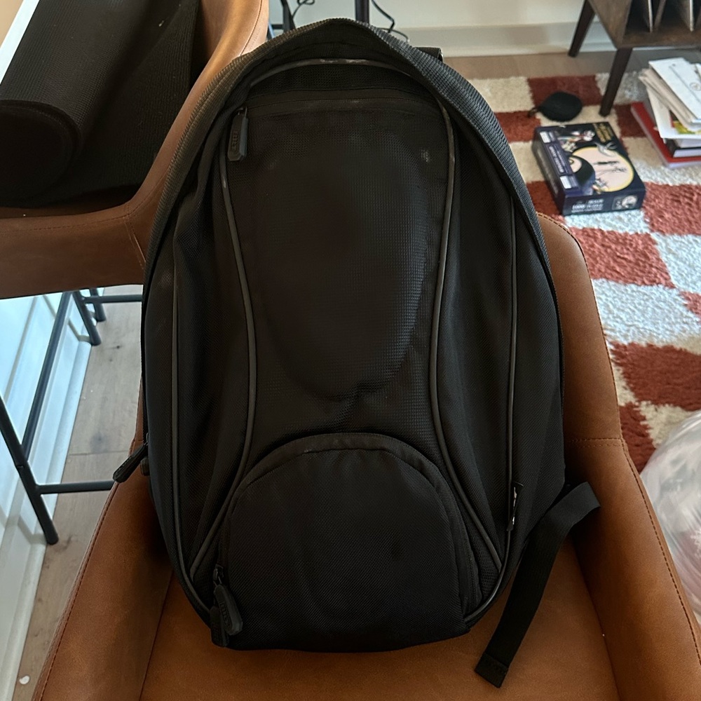 Bilt v3 motorcycle backpack with helmet holder in front pocket